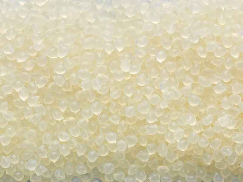 Colorless granules from a hot melt compounding system