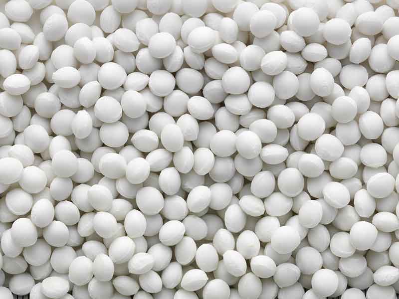 White granules from a hot melt compounding system