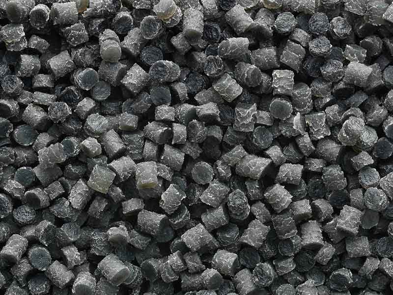 Small black-gray pellets from a rubber compounds compounding technology