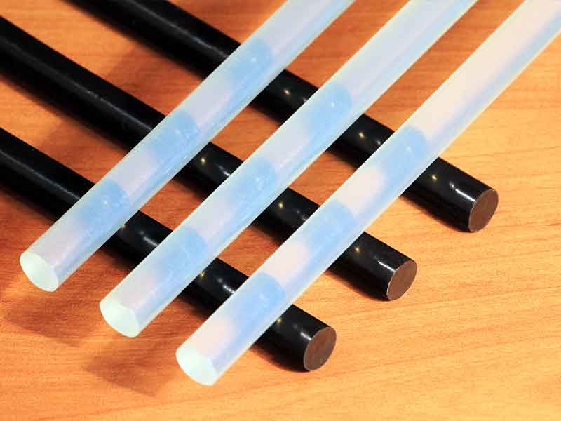 Black and white hot glue bars.