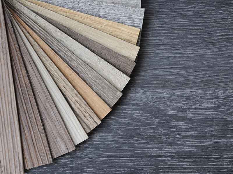 Color examples of synthetic wood showing the versatility of natural fiber composites compounding systems.