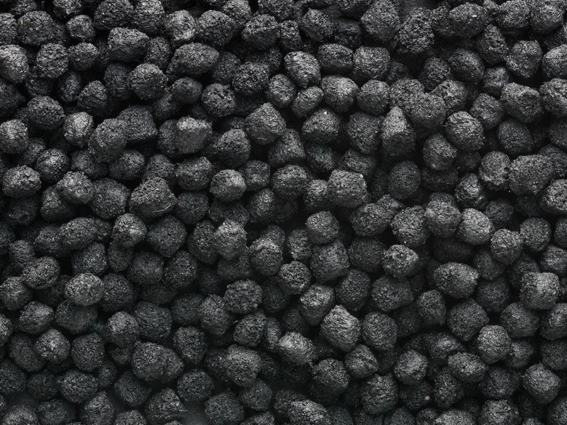 Black granules from rubber compounds made by compounding technology